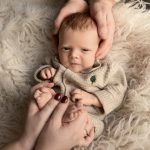 Home newborn photography in Ayrshire capturing tiny newborn details hands and feet